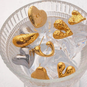 Ατσάλινα σκουλαρίκια καρδιές, καρφάκι, σε κίτρινο χρυσό 22022411