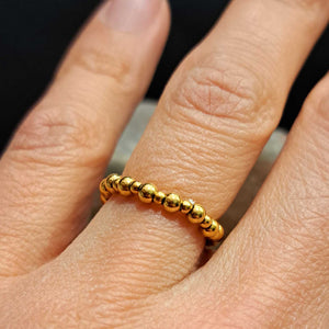 Δαχτυλίδι με κίτρινο χρυσό χάντρες, σε ελαστικό κορδόνι
