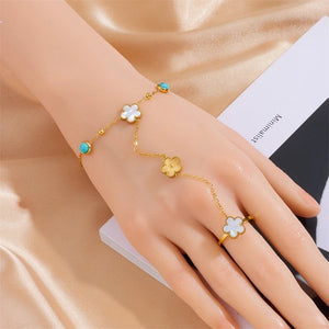 Ατσάλινο βραχιόλι αλυσίδα μαζί με δαχτυλίδι μαργαρίτα με φίλντισι και μπλε πέτρες, σε κίτρινο χρυσό 13032427