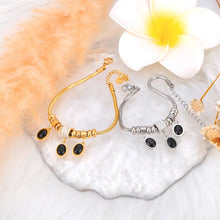 Φόρτωσε την φωτογραφία στο Gallery viewer, Ατσάλινο βραχιόλι αλυσίδα με πλακέ οβάλ, κρεμαστά στοιχεία και στρας, σε κίτρινο χρυσό 19032425G