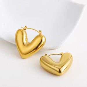 Σκουλαρίκια ατσάλινα κρίκοι σε σχήμα καρδιάς, κίτρινο χρυσό 27022416