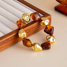 Φόρτωσε την φωτογραφία στο Gallery viewer, Βραχιόλι ακριλικές χάντρες καφέ-χρυσό, δίχρωμο, 20102515