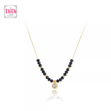 Φόρτωσε την φωτογραφία στο Gallery viewer, Ατσάλινο κολιέ με κρύσταλλα μαύρα περασμένα σε αλυσίδα και κρεμαστό στοιχείο με άσπρη πέτρα, σε κίτρινο χρυσό