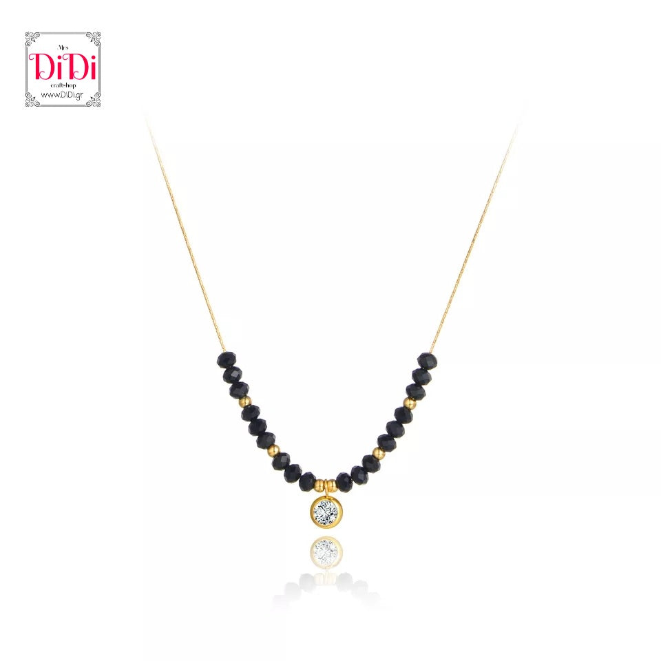 Ατσάλινο κολιέ με κρύσταλλα μαύρα περασμένα σε αλυσίδα και κρεμαστό στοιχείο με άσπρη πέτρα, σε κίτρινο χρυσό